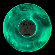 Load image into Gallery viewer, ** NOW SHIPPING ** The Elder Scrolls V: Skyrim &quot;Atmospheres&quot; LP [Exclusive Blue GLOW DUST Filled Variant]
